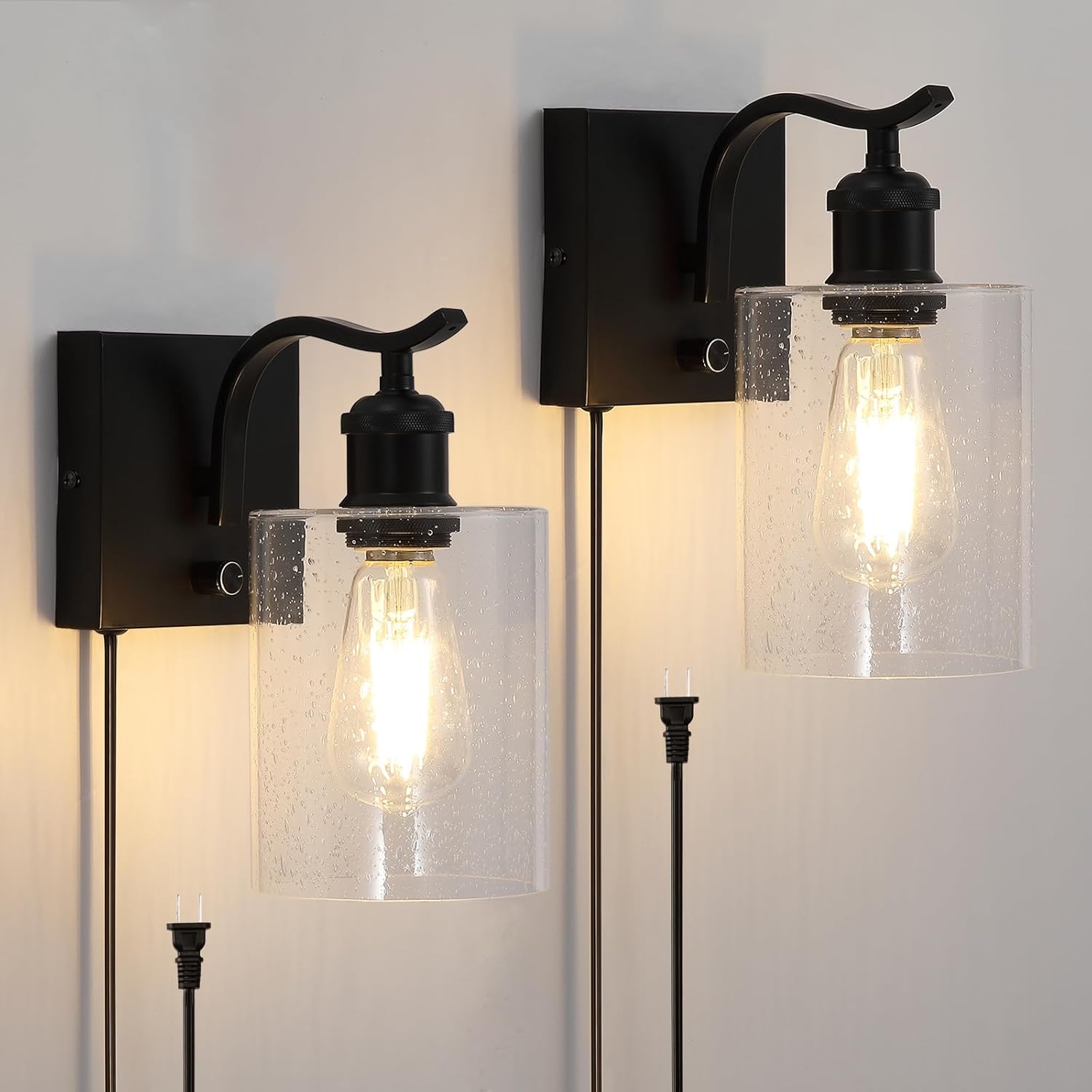 dark moody bedroom ideas with warm wall sconces