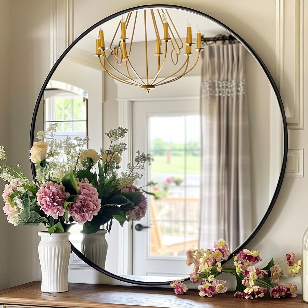 Round black metal mirror statement piece for bedroom